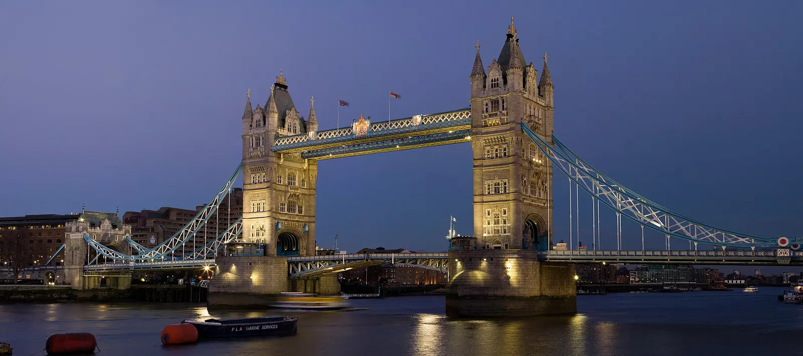 Tower Bridge lit up at dusk